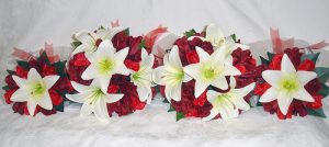 White lillies red roses